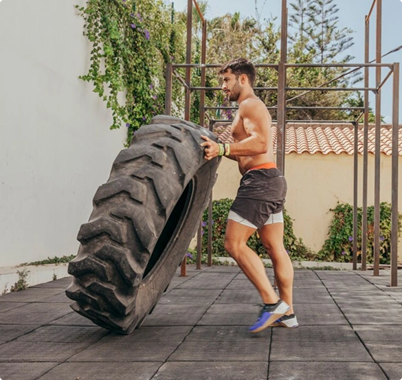 man-lifting-tyre